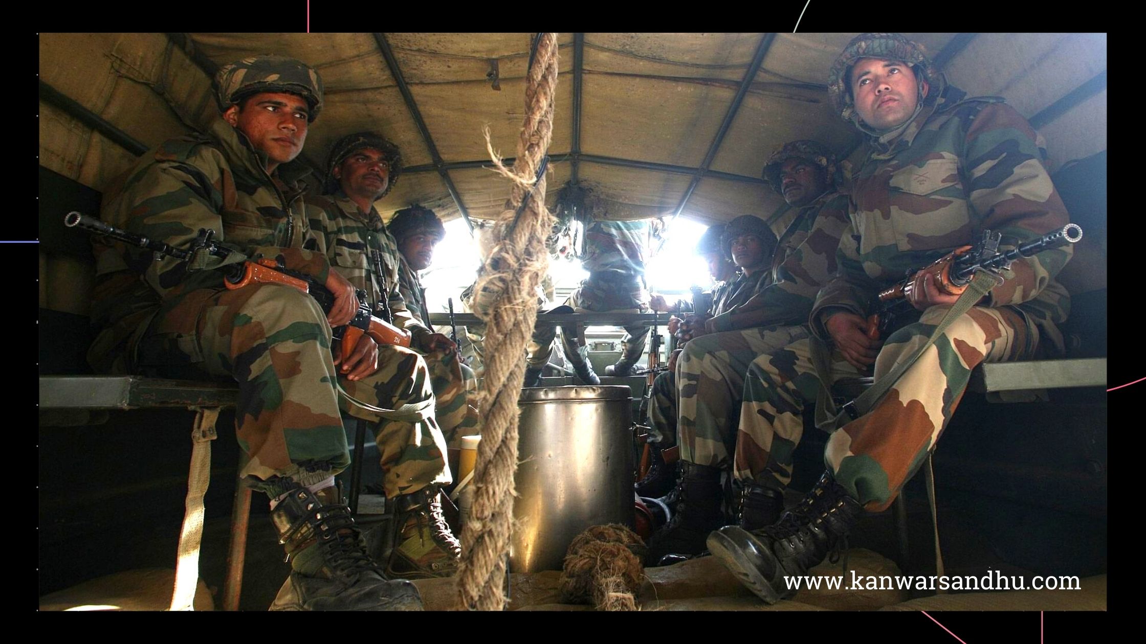 Soldiers sit in a truck as they head towards the Indian Air Force (IAF) base at Pathankot in Punjab, January 3, 2016