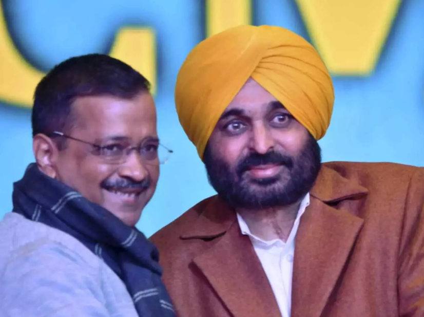 AAP chief Arvind Kejriwal with party's CM candidate for Punjab, Bhagwant Mann. (Photo Credit: PTI)